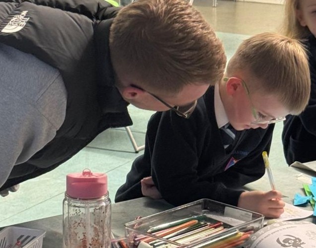 Parent helping child with homework